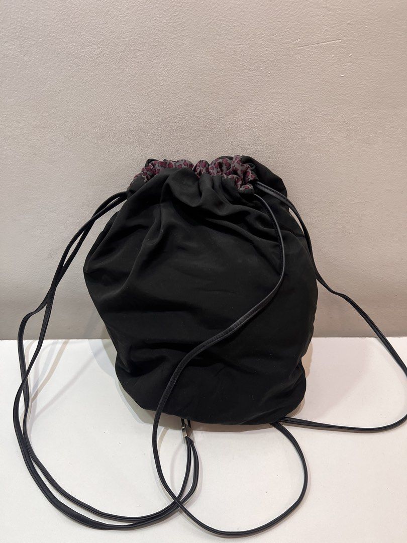 Bottega Veneta Drawstring Nylon Backpack (Category: Luxury Bags & Wallets) located in Cebu City. Submitted by brandedcorner_ph (Listing ID 1464732326, Image 2). Description: Pre-loved ((B))ottega ((V))eneta Drawstring Nylon Backpack 100% Authentic or money back Condition • Excellent condition • No flaws Product Details •Color: Black •Hardware: Silver tone •Material: Nylon •Approximate Dimensions in inches: H13.5 x W11 Color may vary due to lighti
