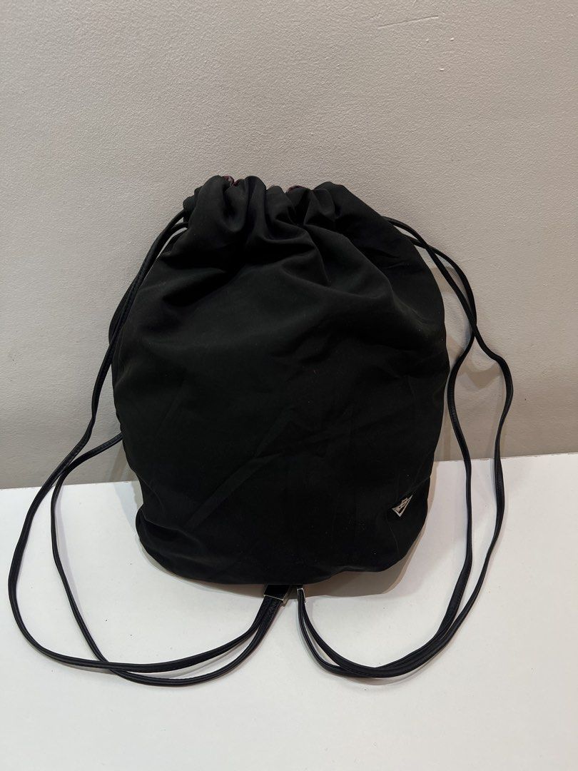Bottega Veneta Drawstring Nylon Backpack (Category: Luxury Bags & Wallets) located in Cebu City. Submitted by brandedcorner_ph (Listing ID 1464732326, Image 1). Description: Pre-loved ((B))ottega ((V))eneta Drawstring Nylon Backpack 100% Authentic or money back Condition • Excellent condition • No flaws Product Details •Color: Black •Hardware: Silver tone •Material: Nylon •Approximate Dimensions in inches: H13.5 x W11 Color may vary due to lighti