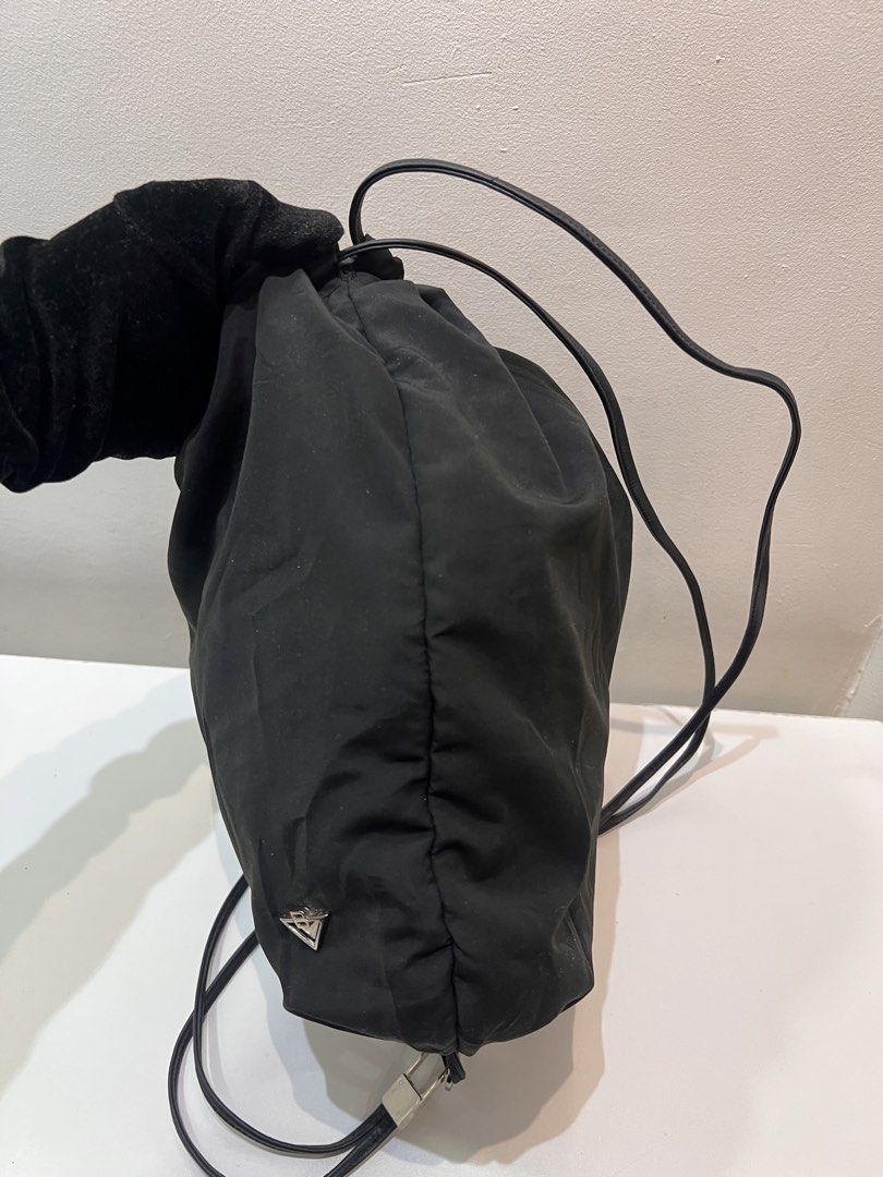 Bottega Veneta Drawstring Nylon Backpack (Category: Luxury Bags & Wallets) located in Cebu City. Submitted by brandedcorner_ph (Listing ID 1464732326, Image 3). Description: Pre-loved ((B))ottega ((V))eneta Drawstring Nylon Backpack 100% Authentic or money back Condition • Excellent condition • No flaws Product Details •Color: Black •Hardware: Silver tone •Material: Nylon •Approximate Dimensions in inches: H13.5 x W11 Color may vary due to lighti