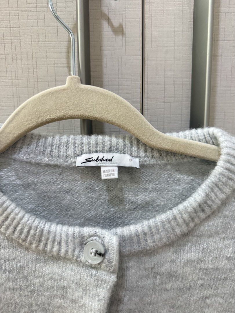 Brandnew Subdued Gray Cardigan (Category: Longsleeves) located in Quezon City. Submitted by emily_in_pariss (Listing ID 1464626939, Image 2). Description: Purchased in Subdued hk! Comes with paperbag.