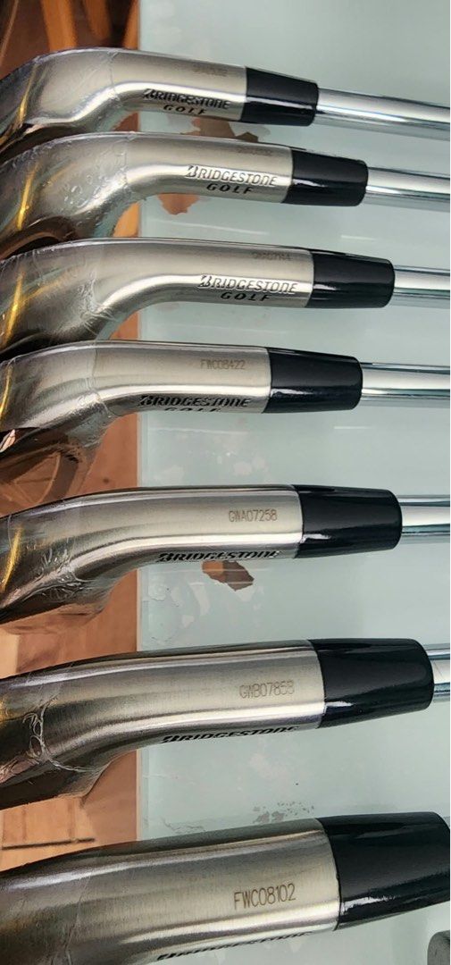 Bridgestone Golf BG-100 Driver, Irons, Putter Set (Category: Golf) located in Calamba. Submitted by purplespaghetti (Listing ID 1464640262, Image 2). Description: - Full set of Bridgestone golf clubs - Includes BG-100 driver - Set of irons: 4-iron to pitching wedge - BG-100 putter included - All clubs still in original plastic wrapping - Perfect for hitting the golf course.