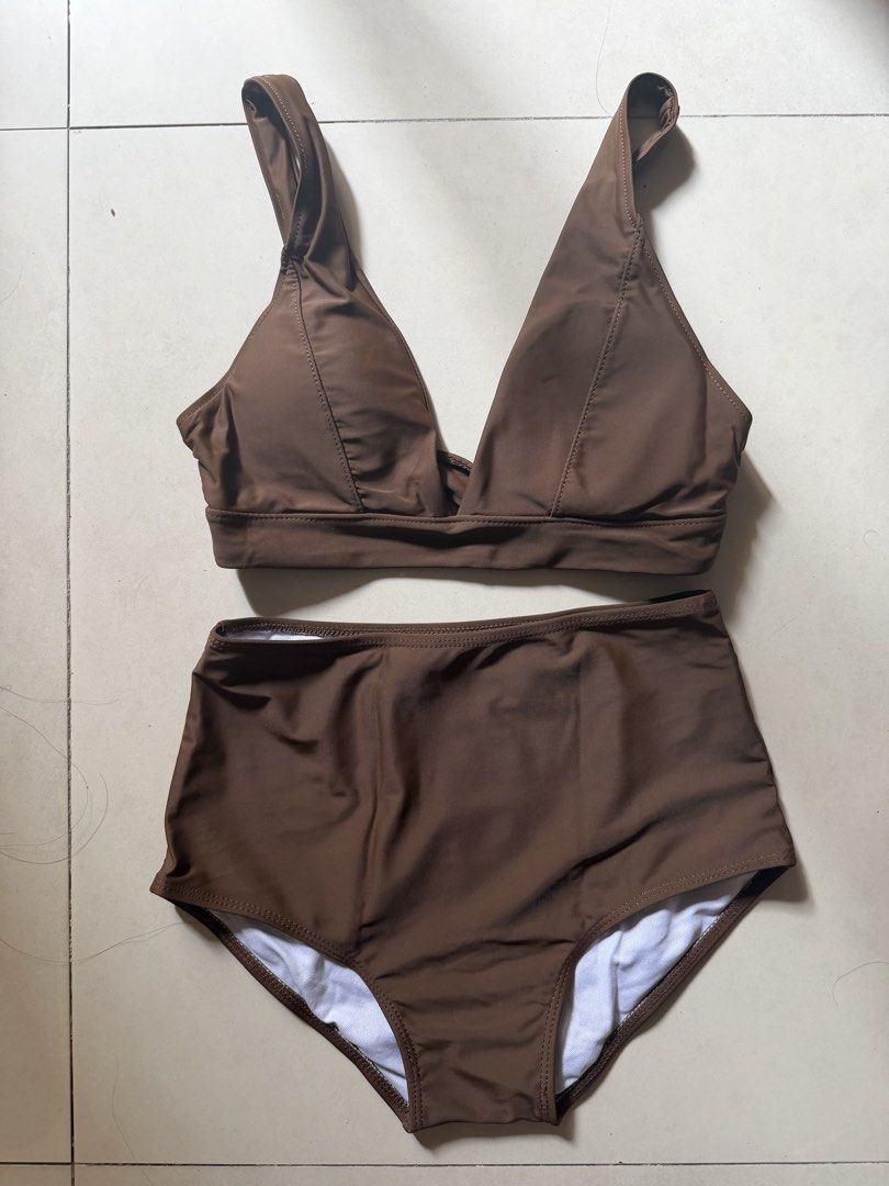 Brown High Waisted Bikini Set (Category: Bikinis & Swimsuits) located in Taguig. Submitted by mryjwll (Listing ID 1464616670, Image 1). Description: - Chic brown bikini set - Flattering high-waisted bottoms - Adjustable triangle bikini top - Smooth and stretchy material for comfort - Perfect for beach or pool.