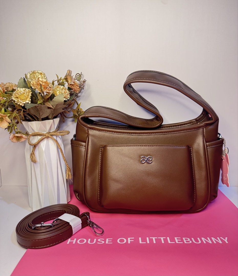 Brown Shoulder Bag with Detachable Strap (Category: Shoulder Bags) located in Manila. Submitted by spademanil18226 (Listing ID 1464613269, Image 1). Description: Aria in Tan * PU leather * Dimensions: 28 cm x 22 cm x 14 cm * Strap Included * Comes with Paper Bag & Tag ✨ 101% AUTHENTIC ✨ 📍 Sta. Ana, Manila 📦 FREE SHIPPING — Metro Manila only DM to order! 🛍️.