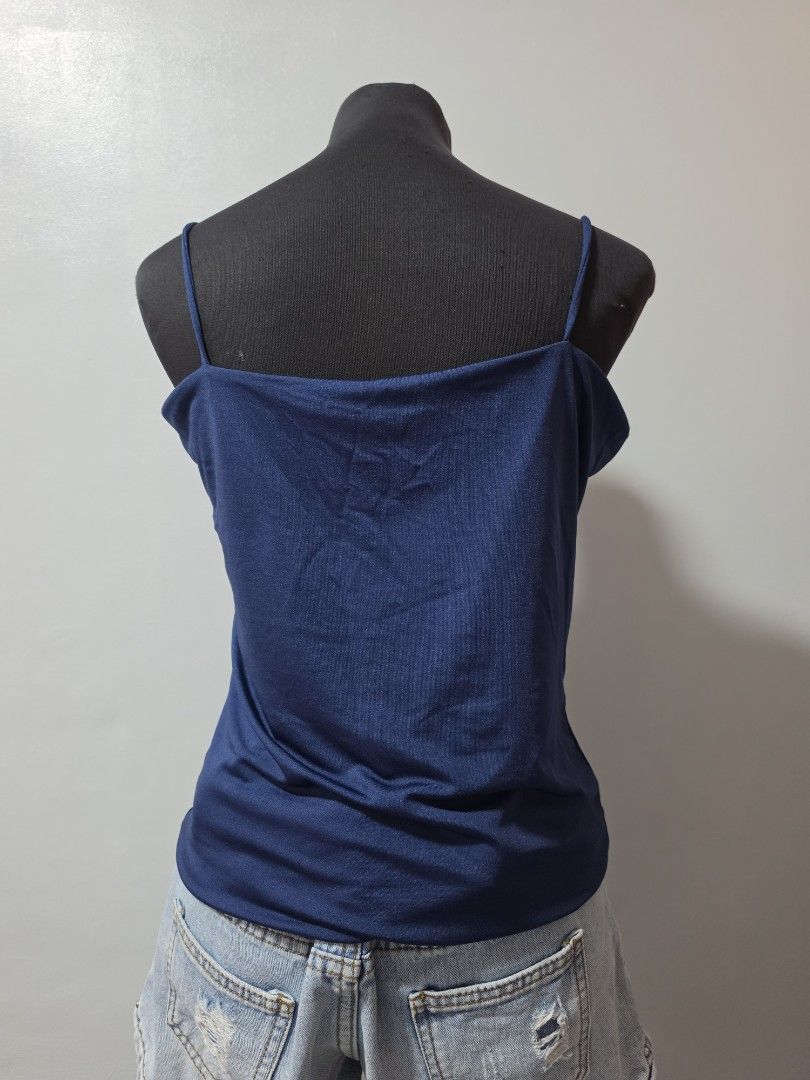 BSCO Navy Blue Spaghetti Strap Top 3xl (Category: Sleeveless) located in Paranaque City. Submitted by franinnashop (Listing ID 1464632109, Image 3). Description: - Navy blue spaghetti strap top - Brand: BSCO - Made in the Philippines - Stretchy material - Estimated size: 3XL - Ideal for casual wear or layering declutter 2xl to 3xl paranaque city.