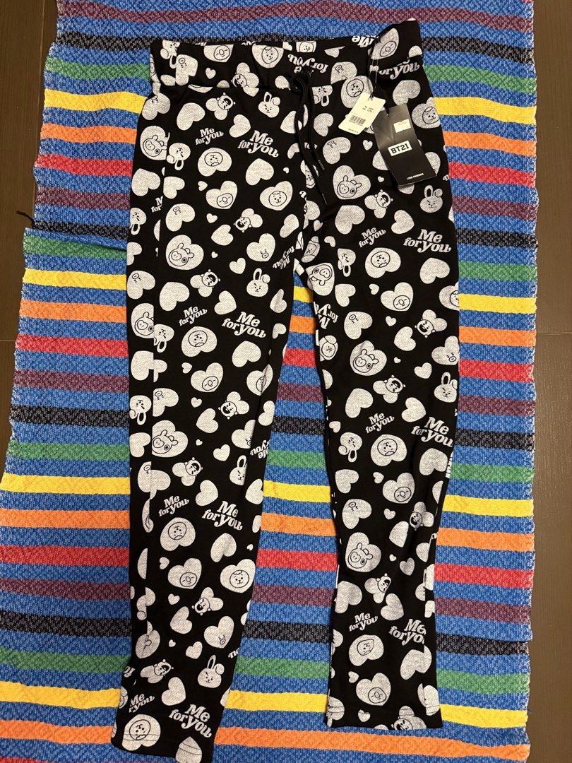 BT21 Me for You Black Pants medium (Category: Other Bottoms) located in Marikina City. Submitted by culose (Listing ID 1464589279, Image 1). Description: - Cute black pants with fun all-over BT21 character and heart print. - Features 'Me for you' text. - Comfortable drawstring waist. - Ideal for lounging or casual wear. - Brand new with tags still attached. Official.