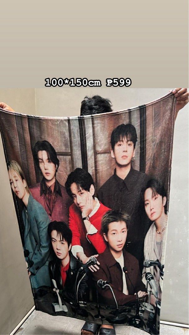 BTS Photo Print Blanket 100x150cm (Category: Bedding & Towels) located in Manila. Submitted by bts_planet94 (Listing ID 1464768431, Image 1). Description: - Large BTS group photo blanket - Size: 100 x 150 cm - Material: Soft and cozy fleece - Clear, high-quality print of all members - Perfect for daily use, watching shows, or room decor - Easy to wash and maintain - A must-have addition to your BTS collection!.