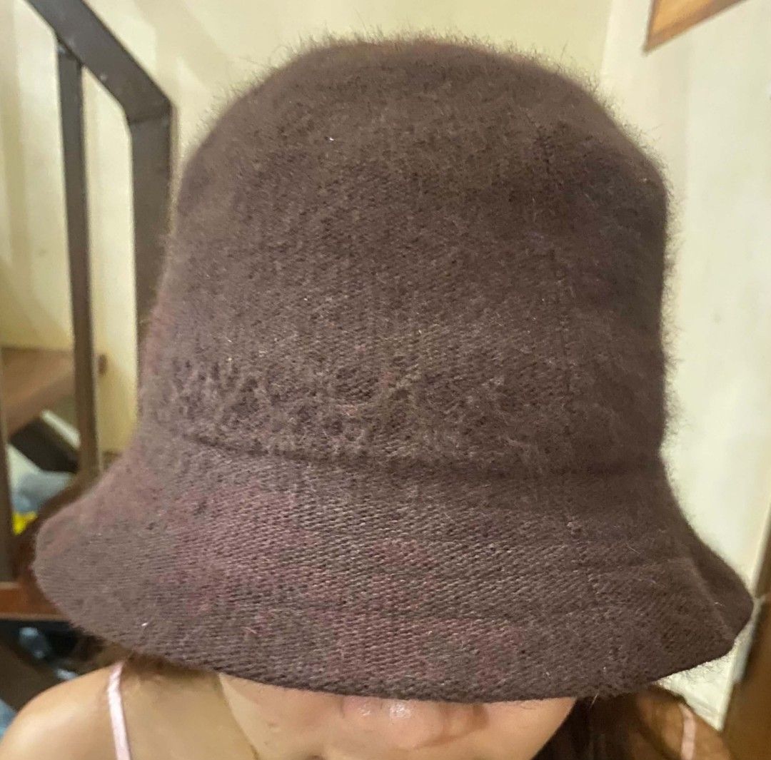 bucket hat (Category: Hats & Beanies) located in Cebu City. Submitted by arni1 (Listing ID 1464724807, Image 1). Description: - Style: Fuzzy knit wide brim bucket hat - Color: Deep brown and maroon - Size: 57.5 cm - Material: Soft, warm textured - Condition: Like new / Great everyday cold-weather accessory - 100 each.