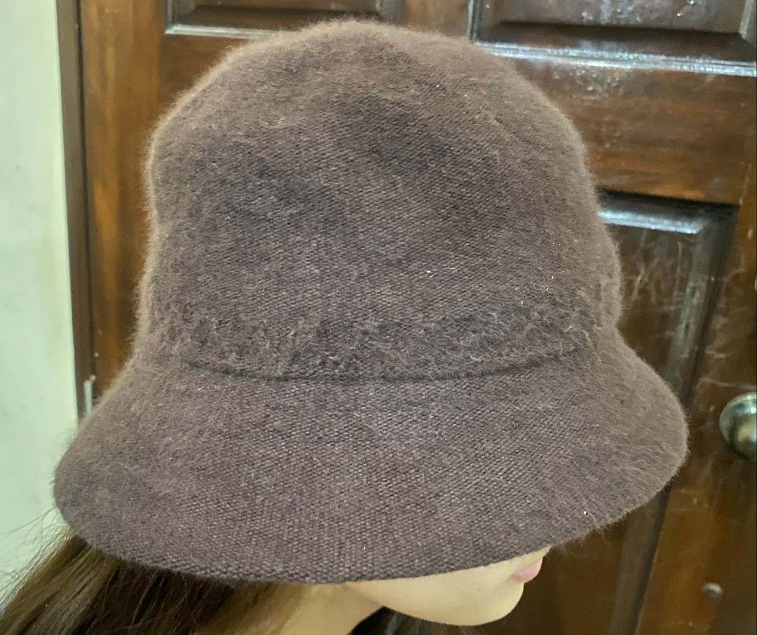 bucket hat (Category: Hats & Beanies) located in Cebu City. Submitted by arni1 (Listing ID 1464724807, Image 2). Description: - Style: Fuzzy knit wide brim bucket hat - Color: Deep brown and maroon - Size: 57.5 cm - Material: Soft, warm textured - Condition: Like new / Great everyday cold-weather accessory - 100 each.