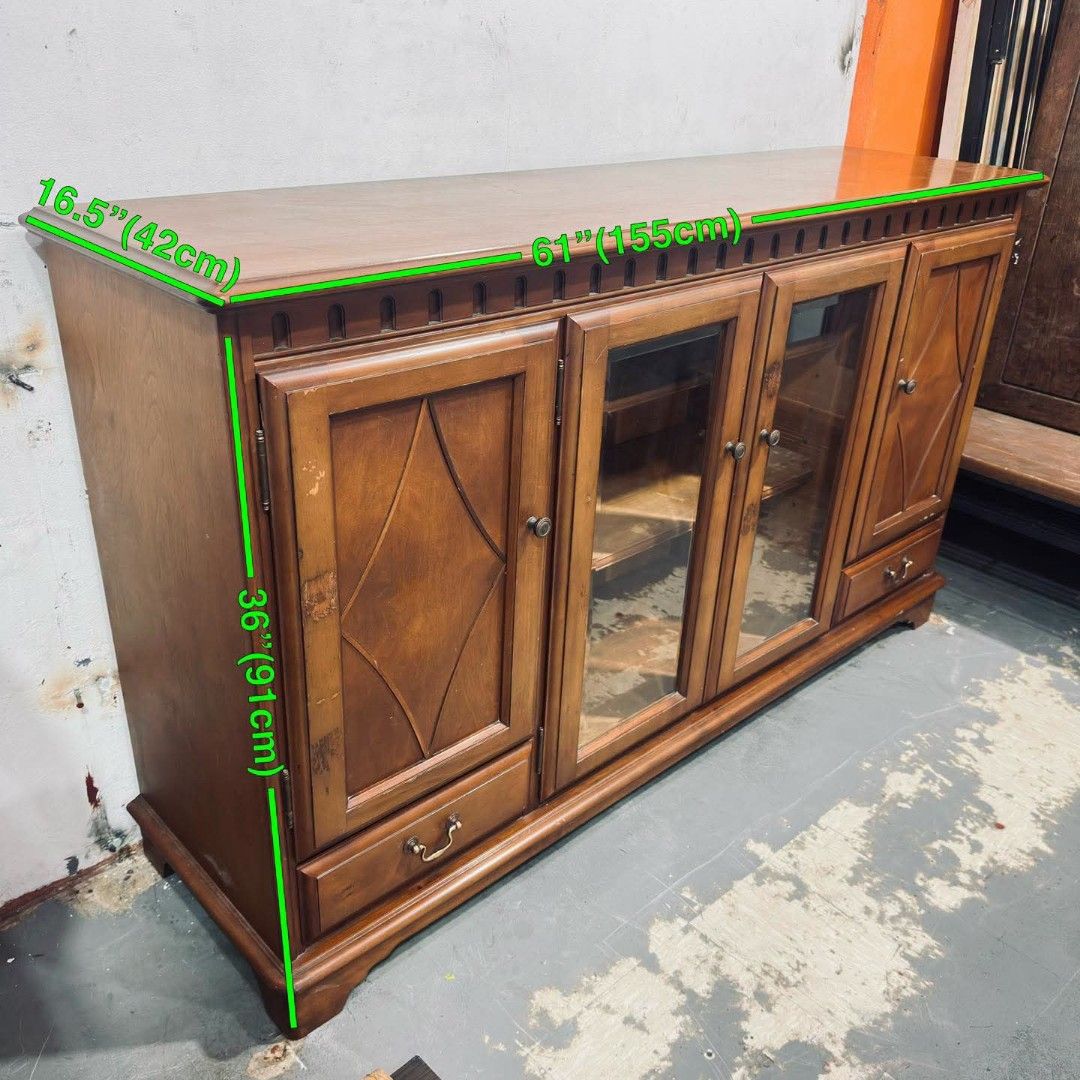 Buffet Sideboard Display Cabinet Credenza (Category: Shelves, Cabinets & Racks) located in Quezon City. Submitted by dannikkishoppe2 (Listing ID 1464703461, Image 3). Description: Buffet Sideboard Display Cabinet Credenza ‼️₱11500‼️ Solid wood Please manage your expectations as there might be minimal flaws. Color may vary due to lighting, it may appear darker or lighter in person. Check photos first before buying. Please refrain from purchasing i
