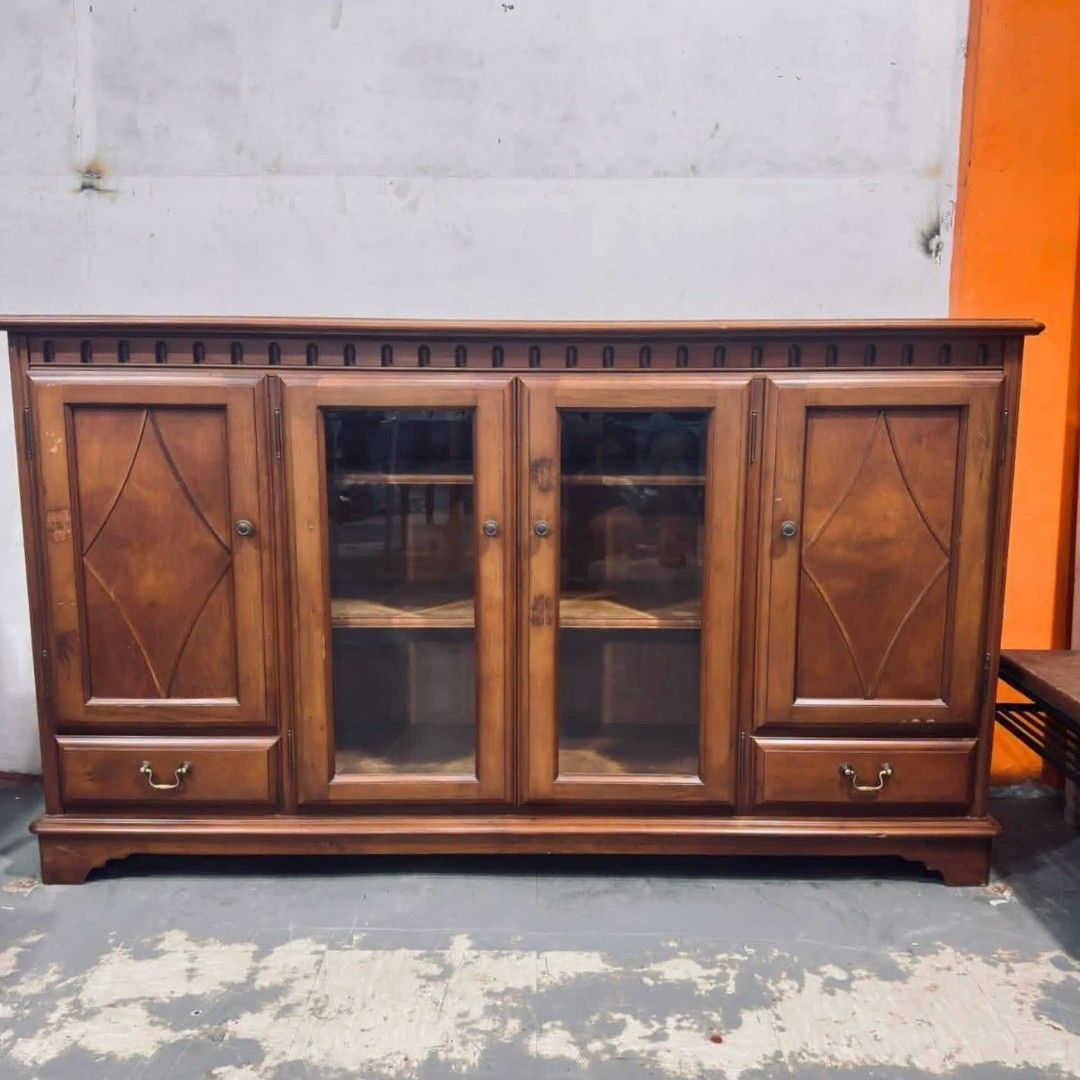 Buffet Sideboard Display Cabinet Credenza (Category: Shelves, Cabinets & Racks) located in Quezon City. Submitted by dannikkishoppe2 (Listing ID 1464703461, Image 2). Description: Buffet Sideboard Display Cabinet Credenza ‼️₱11500‼️ Solid wood Please manage your expectations as there might be minimal flaws. Color may vary due to lighting, it may appear darker or lighter in person. Check photos first before buying. Please refrain from purchasing i