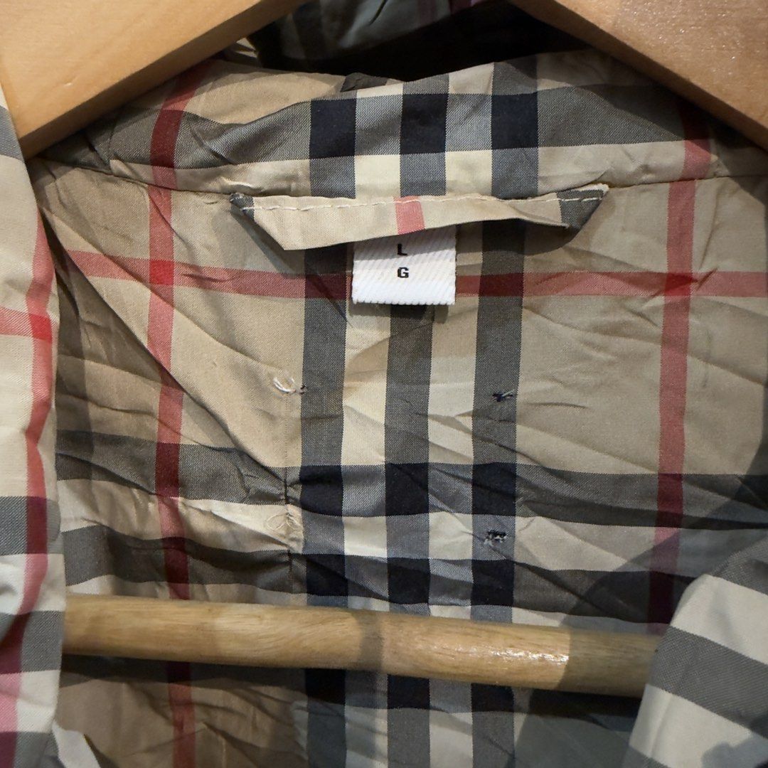 Burberry Black Windbreaker Jacket (Plaid Inside) (Category: Coats, Jackets and Outerwear) located in Manila. Submitted by jerichomal82553 (Listing ID 1464751071, Image 3). Description: Burberry Black Windbreaker Jacket (Plaid Inside) 21.5 by 25.5 Good Condition Missing Neck Tag CLAIM 1500.