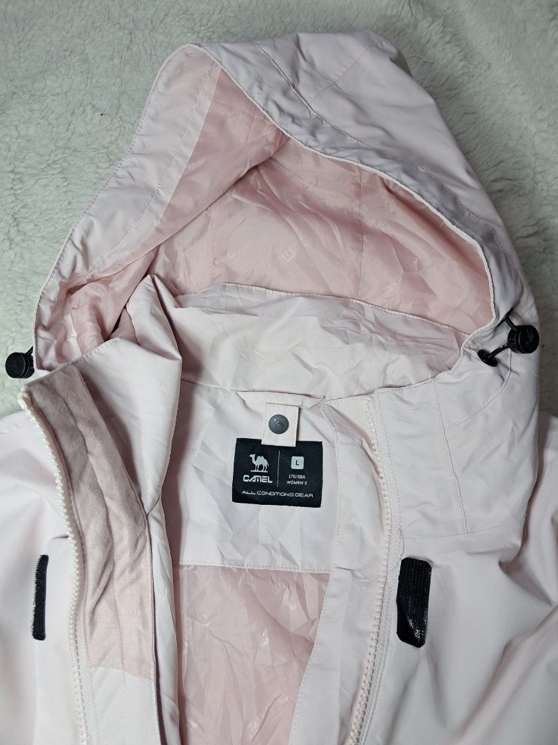 Camel outdoor jacket pink medium to large (Category: Coats, Jackets and Outerwear) located in Baguio. Submitted by mishmashfritz (Listing ID 1464583775, Image 2). Description: Thrifted, large on tag, fit sa medium to large, excellent used condition, mahirap isara yung zipper, water proof material, multiple pockets, adjustable hem and hood.