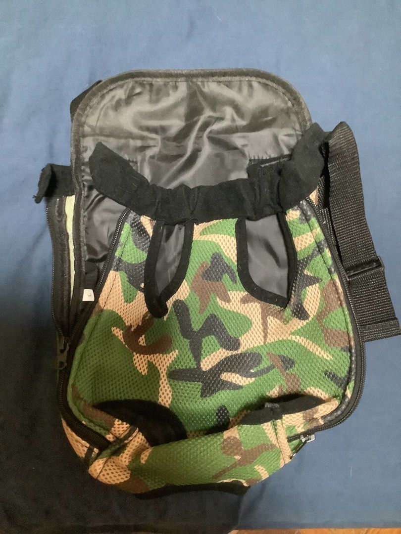 Camouflage Sling Bag with Adjustable Strap (Category: Homes & Other Pet Accessories) located in Las Pinas. Submitted by nanamerch (Listing ID 1464641221, Image 1). Description: - pet carrier size Large - Stylish camo print sling bag pack for pets - Adjustable strap for comfortable wear - Ideal for everyday use and travel - Spacious interior for all your essentials.