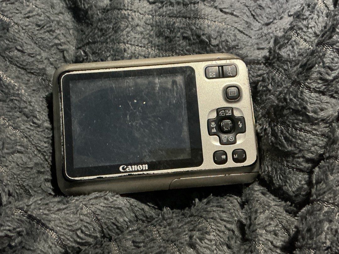 Canon PowerShot A495 Digicam (Category: Cameras) located in Quezon City. Submitted by rienjelmm (Listing ID 1464719392, Image 2). Description: Untested bought from japan surplus as is no return/refund - Model: Canon PowerShot A495 - Color: Silver body with a sleek black grip - Resolution: 10.0 megapixels for clear everyday photos - Features: Built-in flash and rear LCD screen with easy navigation buttons - Design: Pocket-sized point and shoot, id