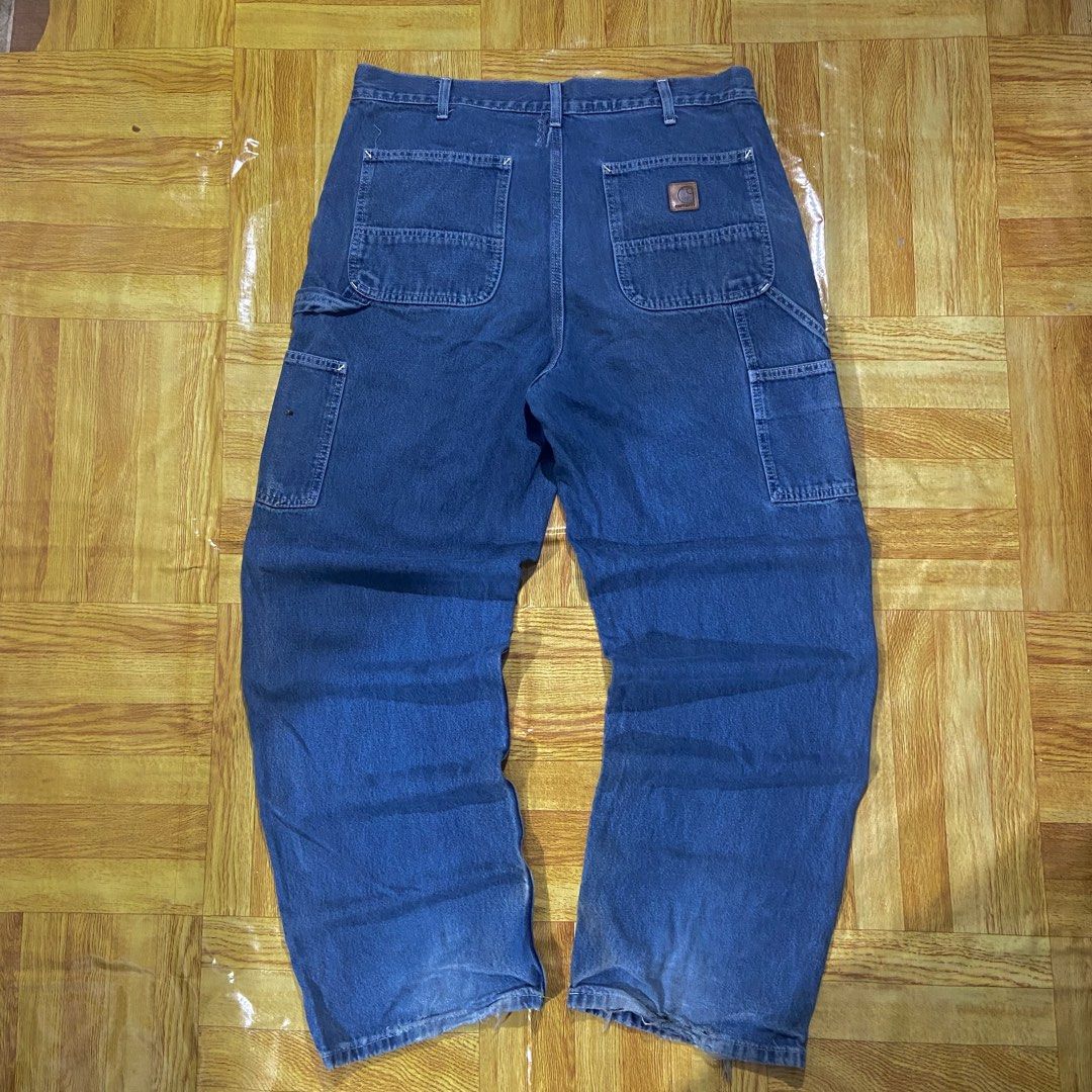 Carhartt Carpenter Denim Pants (Category: Activewear) located in Dasmarinas. Submitted by thrift2gems (Listing ID 1464588935, Image 1). Description: Carhartt Carpenter Denim Pants✨ -WIDTH: 36 -LENGTH: 41.5 -THIGH: 14.5 -LEG OPENING: 9.5 -COLOR RATE: 9.2/10 -CONDITION: 9/10 -ISSUE: CHECK PICS.