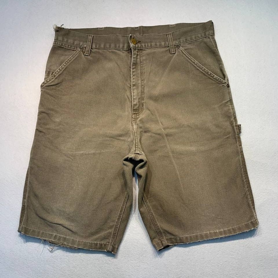 Carhartt Carpenter WIP Short (Category: Shorts) located in Mandaluyong City. Submitted by theroom501 (Listing ID 1464747604, Image 2). Description: Carhartt Carpenter WIP Short Style Code: WIP Size on Tag: 36 Color: Choco/Brown Condition: Good pre-owned condition with a heavily distressed vintage look. Flaws/Issues: Heavy distressing throughout the fabric. Flat Lay Measurements: Pit to Pit: 36 inches Length: 23 inches Leegopening Length: 10 inche