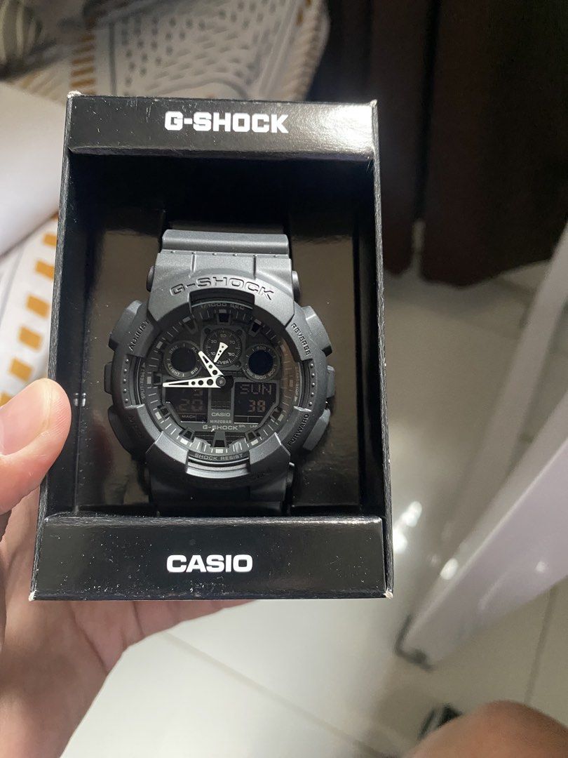 Casio G-Shock GA-100 Black Watch (Category: Men's Watches) located in Manila. Submitted by luistrokac48223 (Listing ID 1464763033, Image 2). Description: - Model: Casio G-Shock GA-100 (Matte Black) - Condition: Brand new, never worn, pristine condition - Durability: Shock resistant, magnetic resistant, and 200m water resistant - Inclusions: Original box and hang tag included - Perfect for daily wear or collection.