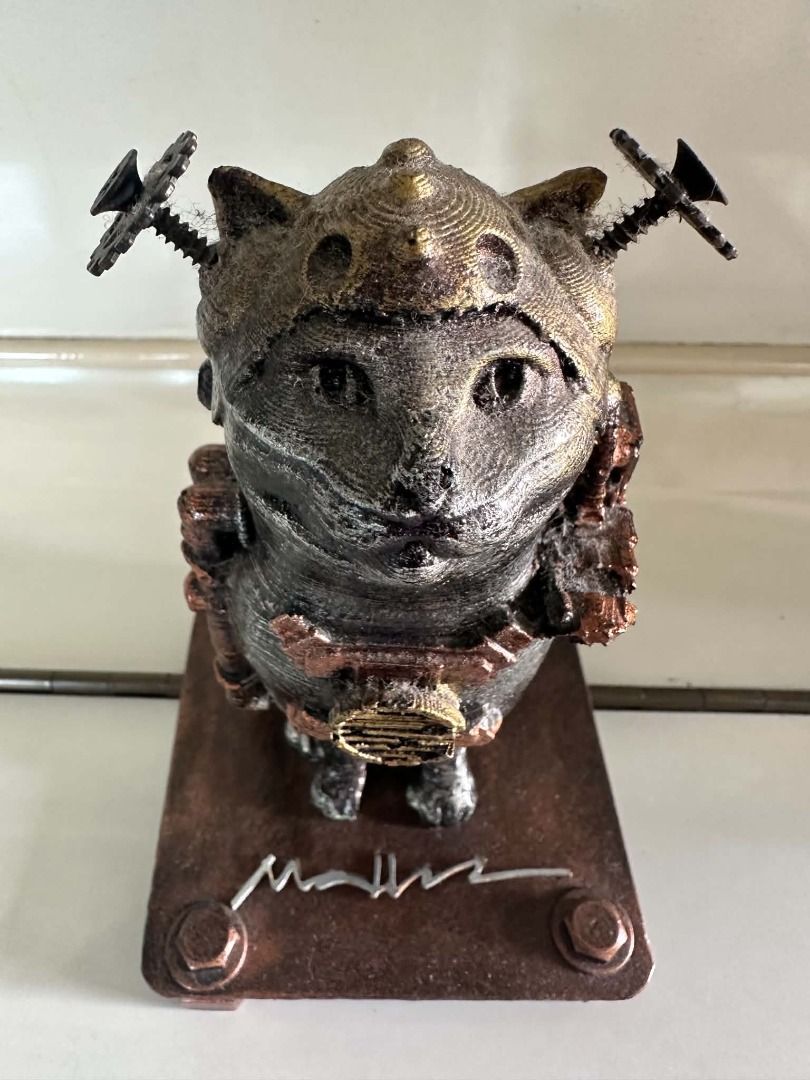Cat Sculpture by Ram Mallari (Category: Figurines & Statues) located in Caloocan City. Submitted by wildfish_c7f4b4 (Listing ID 1464604006, Image 1). Description: Title: Steampunk Cat Medium: Reclaimed and welded metals, mixed media assemblage on metal base with artist signature Dimensions: Approx. H: 6-7 in (15-18 cm) incl. base Year: Contemporary Condition: Good. A charming steampunk cat sculpture by acclaimed Filipino artist Ram Mallari, widel