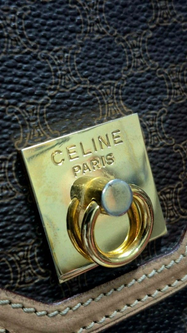 Celine Macadam Pattern Clutch Bag (Category: Clutches) located in Muntinlupa City. Submitted by coolstorm.2026 (Listing ID 1464585817, Image 3). Description: - Iconic Celine Macadam print in brown and tan. - Genuine leather trim and gold-tone hardware. - Secure snap button closure on the front flap. - Interior zip pocket for organized storage. - Celine Paris Made in Italy leather tag. - Compact and perfect for carrying your daily essentials. Othe
