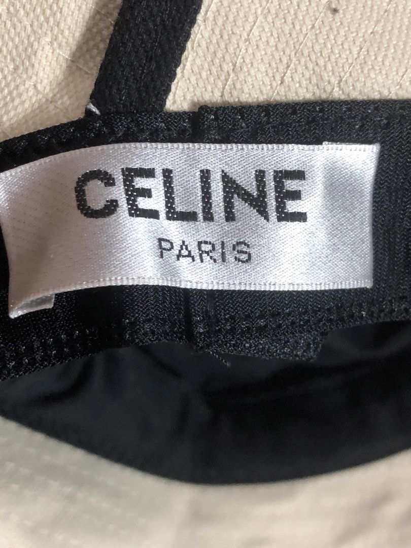 Celine Paris Bucket Hat (Category: Hats & Beanies) located in Montevista. Submitted by rdthriftshub (Listing ID 1464655309, Image 3). Description: - Cream colored bucket hat - Black trim detail - Features iconic Celine logo - Fits small to medium size - Perfect for sunny days.