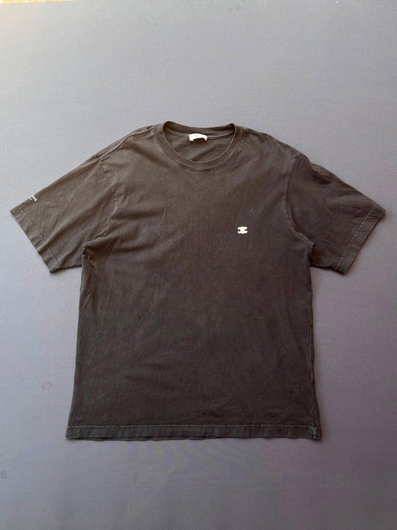 Celine Paris Logo T-Shirt (Category: Shirts) located in Pasacao. Submitted by kakiethriftapparel01217 (Listing ID 1464644806, Image 1). Description: - Classic black Celine t-shirt - Size: Medium (M) - Features iconic Triomphe logo on chest - Celine Paris print on sleeve - Material: 100% Cotton - Made in Italy.