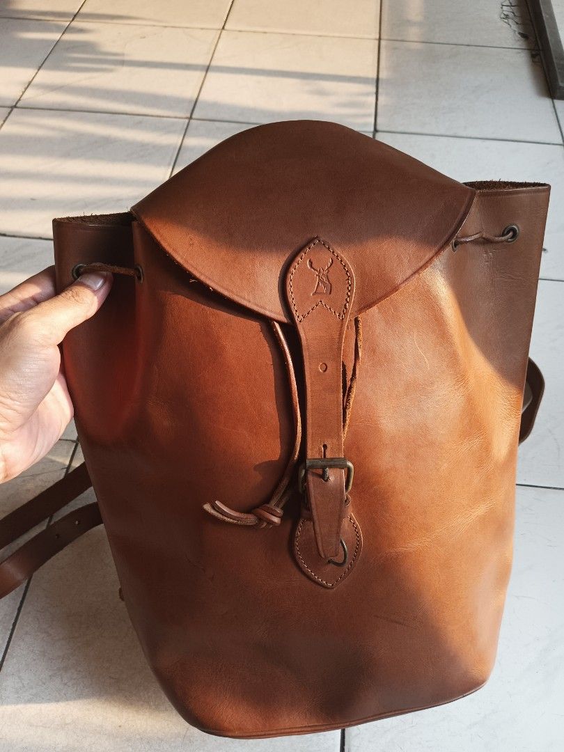 Cervo Brown Genuine Leather Drawstring Backpack (Category: Backpacks) located in Quezon City. Submitted by arvietekto (Listing ID 1464598124, Image 1). Description: Cervo Genuine Leather Backpack excellent quality excellent materials 100% genuine leather made ing italy affordable just message me for additional information and deals. - Classic brown leather backpack - Brand: Cervo - Made in Italy - Features drawstring closure - Adjustable leather 