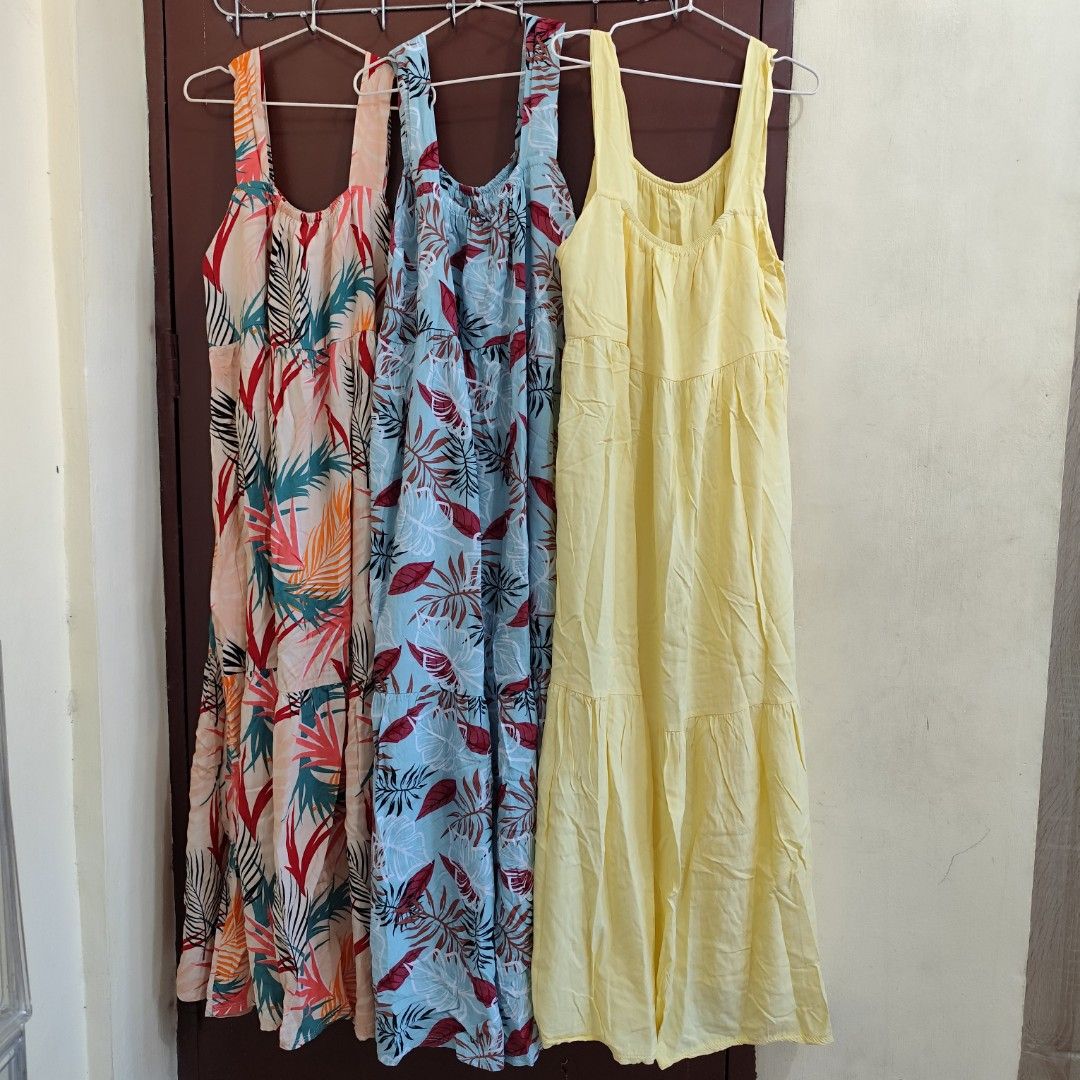 Challis Maxi Dress (Category: Dresses) located in Baao. Submitted by elis.closet (Listing ID 1464570428, Image 1). Description: - Three flowy challis maxi dresses - Perfect for casual wear or beach vacations - Comfortable and breezy fabric - Tiered design for a flattering silhouette - Scoop neckline - Available prints: Tropical leaf (pink/orange, blue/red) - Available solid color: Pastel yellow Used no more than 3x PHP 270 each or Take All for PH