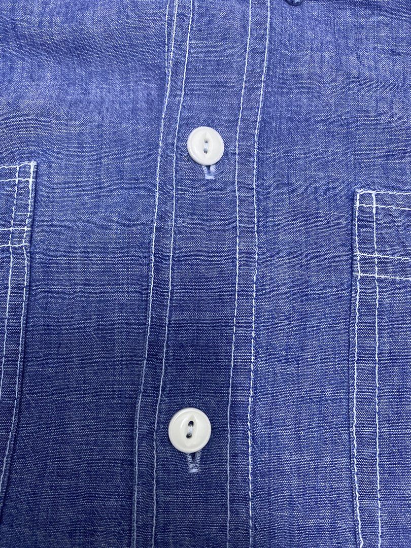 Chambray (Category: Formal Shirts) located in Kuala Selangor. Submitted by amirkdc85 (Listing ID 1464719246, Image 3). Description: - Brand: Old School - Style: Classic workwear blue chambray long sleeve shirt - Details: Dual chest flap pockets with white contrast stitching - Closure & Cuffs: Button front closure and button cuffs - Hem: Rounded hem - Condition: Great casual piece Pit 20 labuh 28.