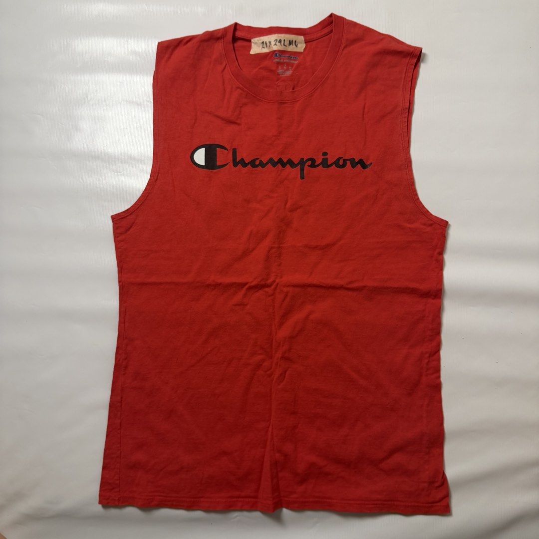 Champion Red Sleeveless Tank Top (Category: Tshirts & Polo Shirts ) located in Manila. Submitted by johnedel_james (Listing ID 1464686641, Image 1). Description: - Red Champion sleeveless tank top - Classic Champion logo across the chest - Small embroidered C logo on the back near the collar - Size: Large (L) - Perfect for workouts or casual wear - Note: Shows some signs of wear on the collar tag.