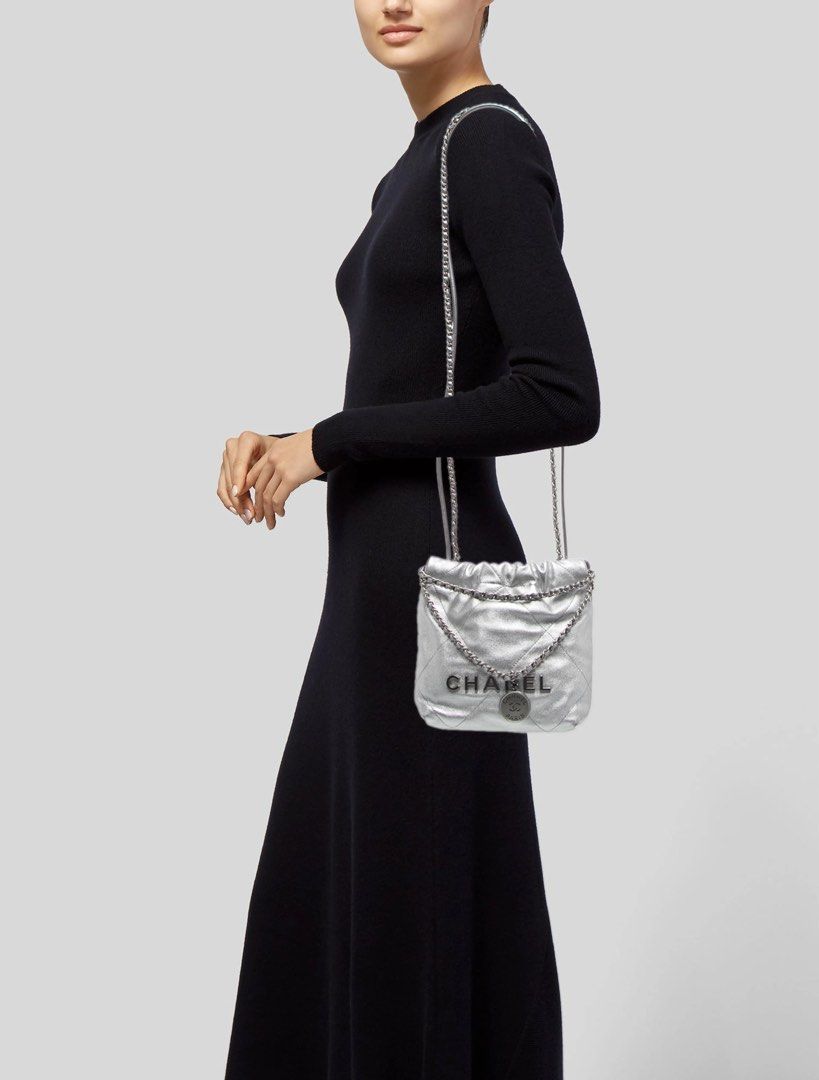 Chanel 22 Mini Handbag Metallic Silver (Category: Shoulder Bags) located in Cavite. Submitted by PRIVATE.Selection (Listing ID 1464617830, Image 1). Description: Chanel 22 Mini Handbag Metallic Silver -Crafted from diamond quilted metallic calfskin leather paired with tonal silver tone hardware. Has a Minor color fadings, check the last pics .