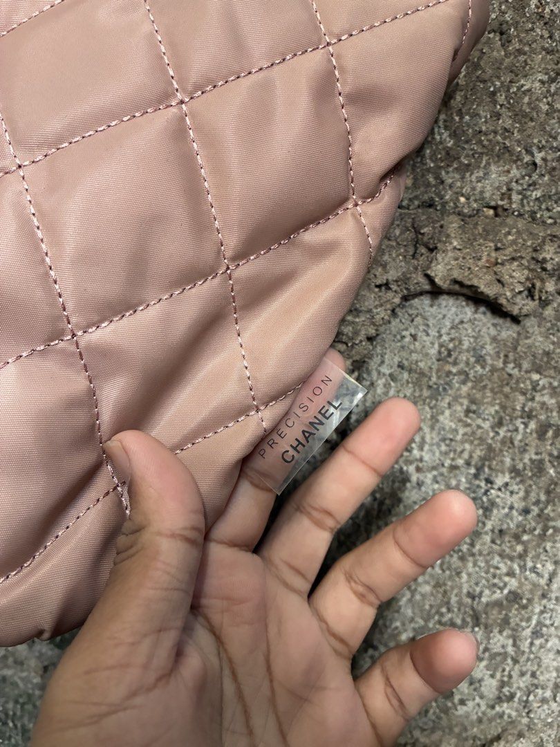 Chanel Precison Quilted Tote Bag (Category: Luxury Bags & Wallets) located in Manila. Submitted by assortedgoodsv3 (Listing ID 1464764687, Image 2). Description: - Authentic pink quilted nylon tote bag with bold black CC logo - Features double top handles (brand new, still wrapped in plastic) - Secure zippered main compartment with black fabric lining - Interior includes Chanel Made In Italy leather tag and Precision Chanel clear tag - Lightweigh