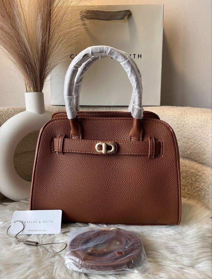Charles & Keith Aubrielle Hand and Sling Bag-Brown (Category: Shoulder Bags) located in Pasig City. Submitted by preloved.closet2 (Listing ID 1464761236, Image 1). Description: Fixed Price With Sling Color Brown Add paperbag plus 80 .