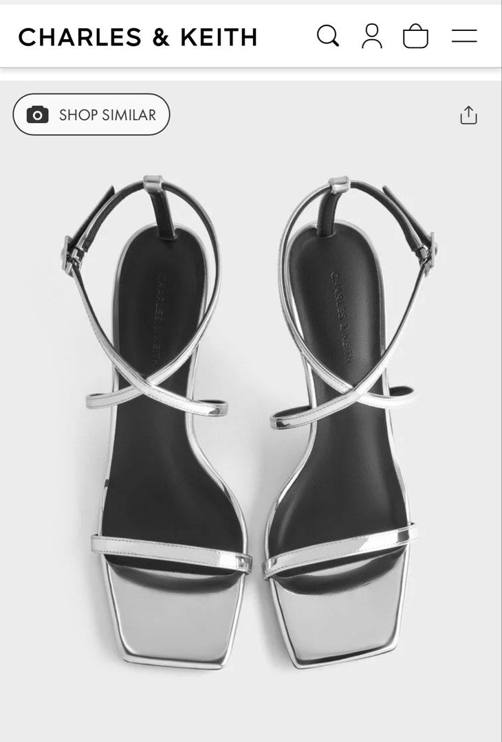 Charles & Keith Silver Strappy Square Toe Heels (Category: Heels) located in San Juan City. Submitted by chefsexytingz (Listing ID 1464659891, Image 2). Description: Used only once at a wedding. Super bago pa as in. No scratches. Size 7. Heels almost 4” ✨Slighty negotiable✨ - Brand: Charles & Keith - Color: Silver - Style: Strappy heels - Features: Square toe, ankle strap - Heel: Metallic silver - Occasion: Perfect for nights out or special occas