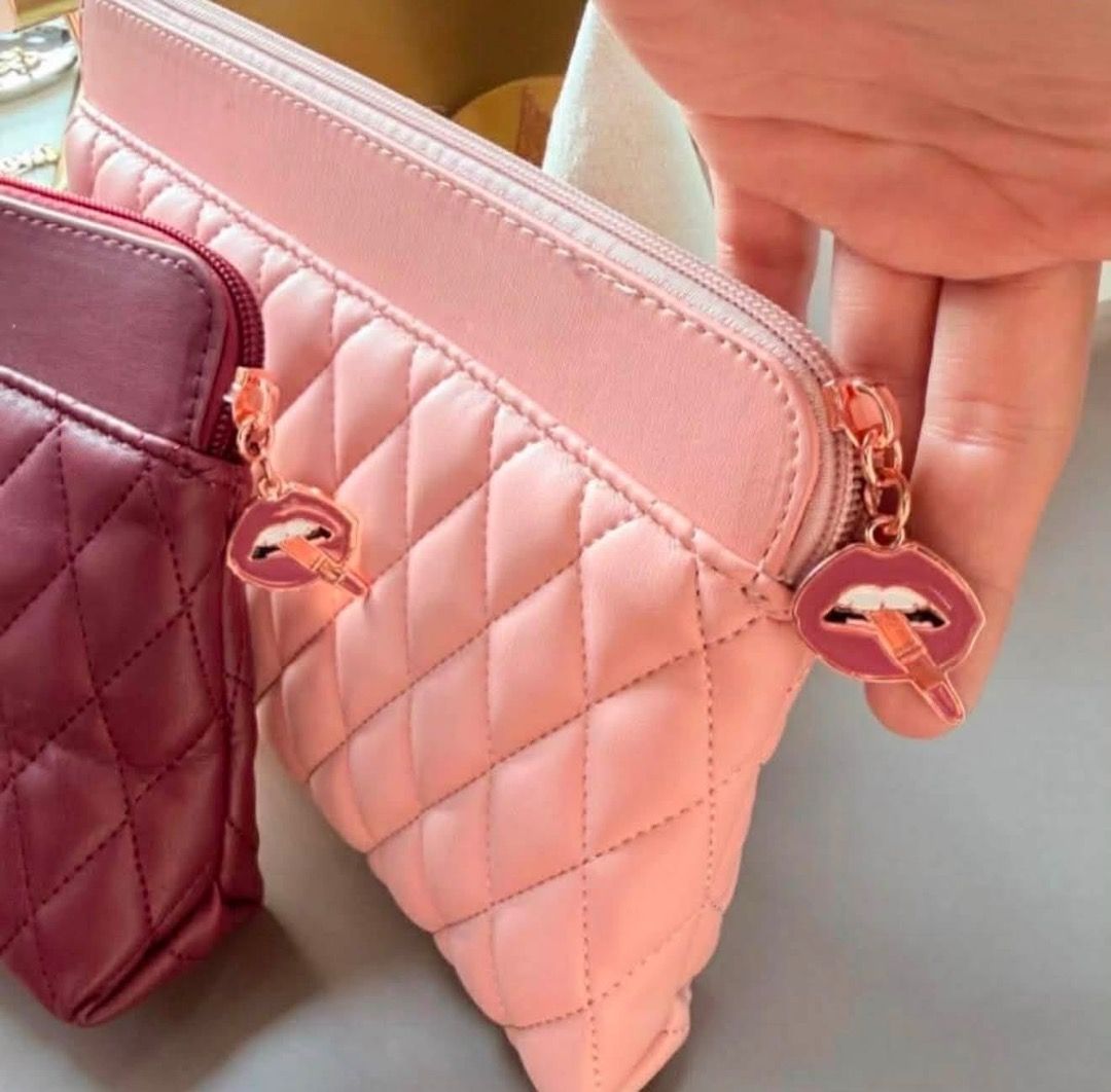 Charlotte Tilbury Pillow Talk Makeup Set and Pouch (Category: Makeup) located in Cebu City. Submitted by kyeshamori24 (Listing ID 1464701535, Image 2). Description: - 100% Authentic Charlotte Tilbury Pillow Talk collection bundle - Iconic pink and rose gold matching theme - Includes quilted pink makeup pouch with signature lip zipper pulls - Full set features: Setting spray, compact powder, heart compact, lipstick, and makeup brush - Comes with a