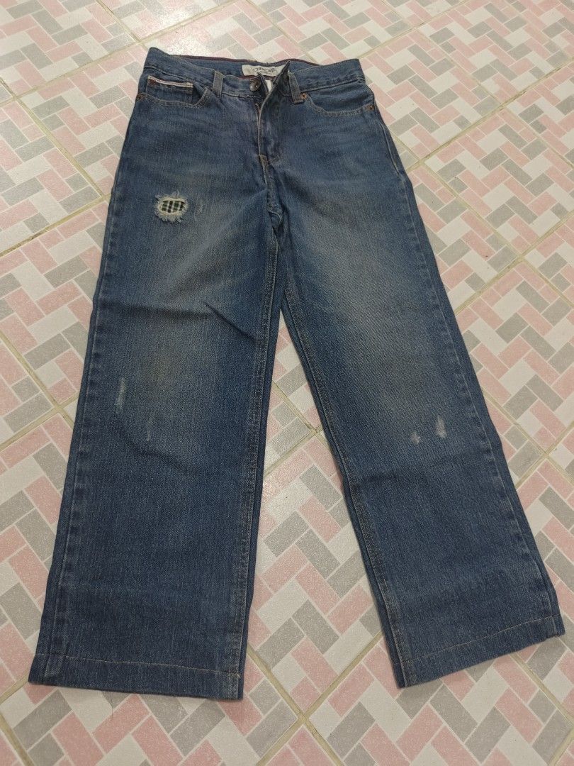 Cherokee Straight Fit Jeans Size 12 (Category: Babies & Kids Fashion) located in Paranaque City. Submitted by zirem (Listing ID 1464626532, Image 1). Description: - Brand: Cherokee - Style: Straight Fit Jeans - Size: 12 - Color: Blue Denim - Length: 32 inches - Waist: 13 inches (laid flat) - Features: Adjustable waist buttons inside, distressed details on pockets - Origin: Made in China - Condition: Please check photos for exact condition..