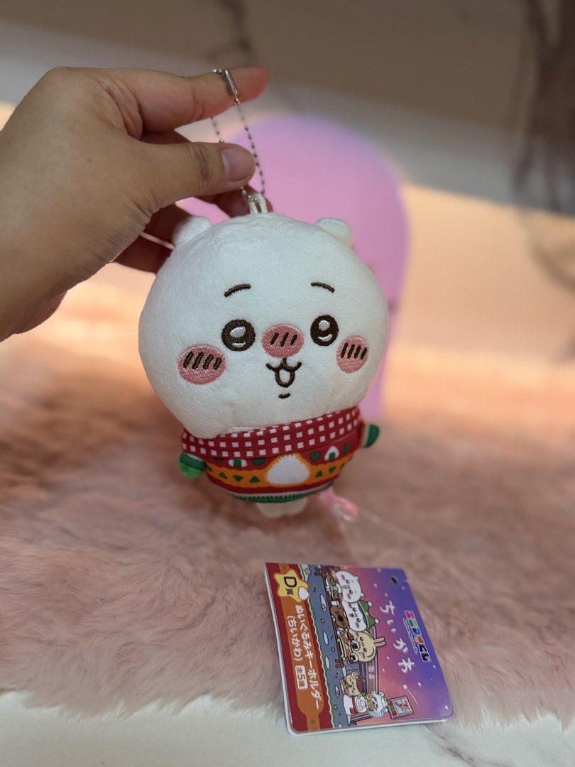 Chiikawa Plush Keychain (Category: Plushies & Soft Toys) located in Quezon City. Submitted by parischanelcollection (Listing ID 1464748281, Image 1). Description: - Authentic Ichiban Kuji Chiikawa plush keychain - Features Chiikawa wearing an adorable red-patterned winter sweater - Brand new with original hang tag attached - Made with ultra-soft, clean white plush material - Equipped with a sturdy metal ball chain for bags or keys - Perfect for c