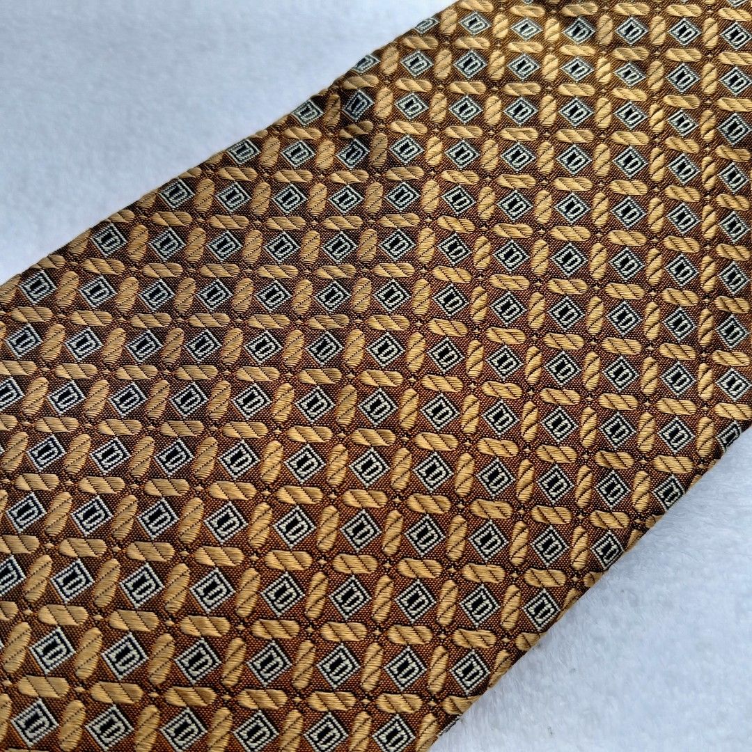 Christian Dior Gold Geometric Square Monogram Pattern Tie / Necktie (Category: Ties) located in Abucay. Submitted by gibzzz123 (Listing ID 1464589465, Image 2). Description: Regular / Classic Necktie • All items are ON HAND and ready to be shipped/picked up. • Items are preloved/ukay, so please expect minimal signs of usage unless stated otherwise. • No major issues — good condition unless otherwise indicated in the listing. • Actual color may sl