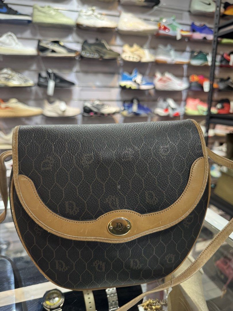 Christian Dior Monogram Shoulder Bag (Category: Luxury Bags & Wallets) located in Baguio. Submitted by luxurysales2600 (Listing ID 1464579654, Image 2). Description: - Authentic Vintage Christian Dior Shoulder Bag - Classic Dior Monogram Pattern - Tan Leather Trim and Strap - Gold-Tone Hardware with Dior Logo Clasp - Made in France.