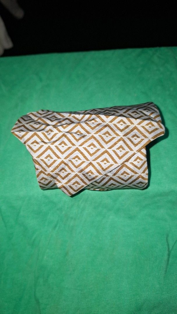 Christian Dior Silk Tie (Category: Luxury Apparel) located in Coron. Submitted by sirizchoice (Listing ID 1464579026, Image 1). Description: - Authentic Christian Dior tie - 100% Silk - Ideal for formal occasions or elevating any outfit.