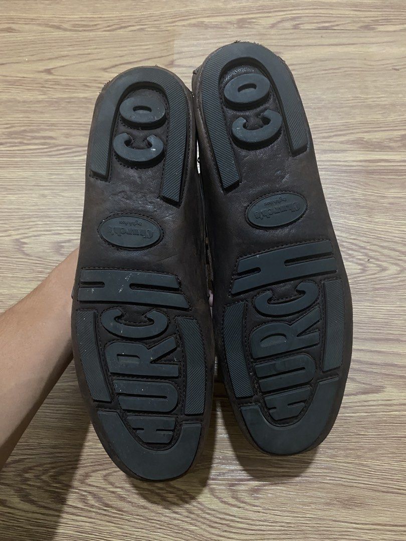Church's Brown Leather Monk Strap Loafers (Category: Dress Shoes) located in Cebu City. Submitted by exeeell (Listing ID 1464691492, Image 3). Description: - Brand: Church's - Style: Slip-on driver monk strap loafers with gold-tone metal buckles - Color: Rich dark brown leather - Soles: Distinctive textured rubber sole with embossed Church & Co branding - Condition: Normal wear on heels and soles - Inclusions: Wooden shoe trees included.