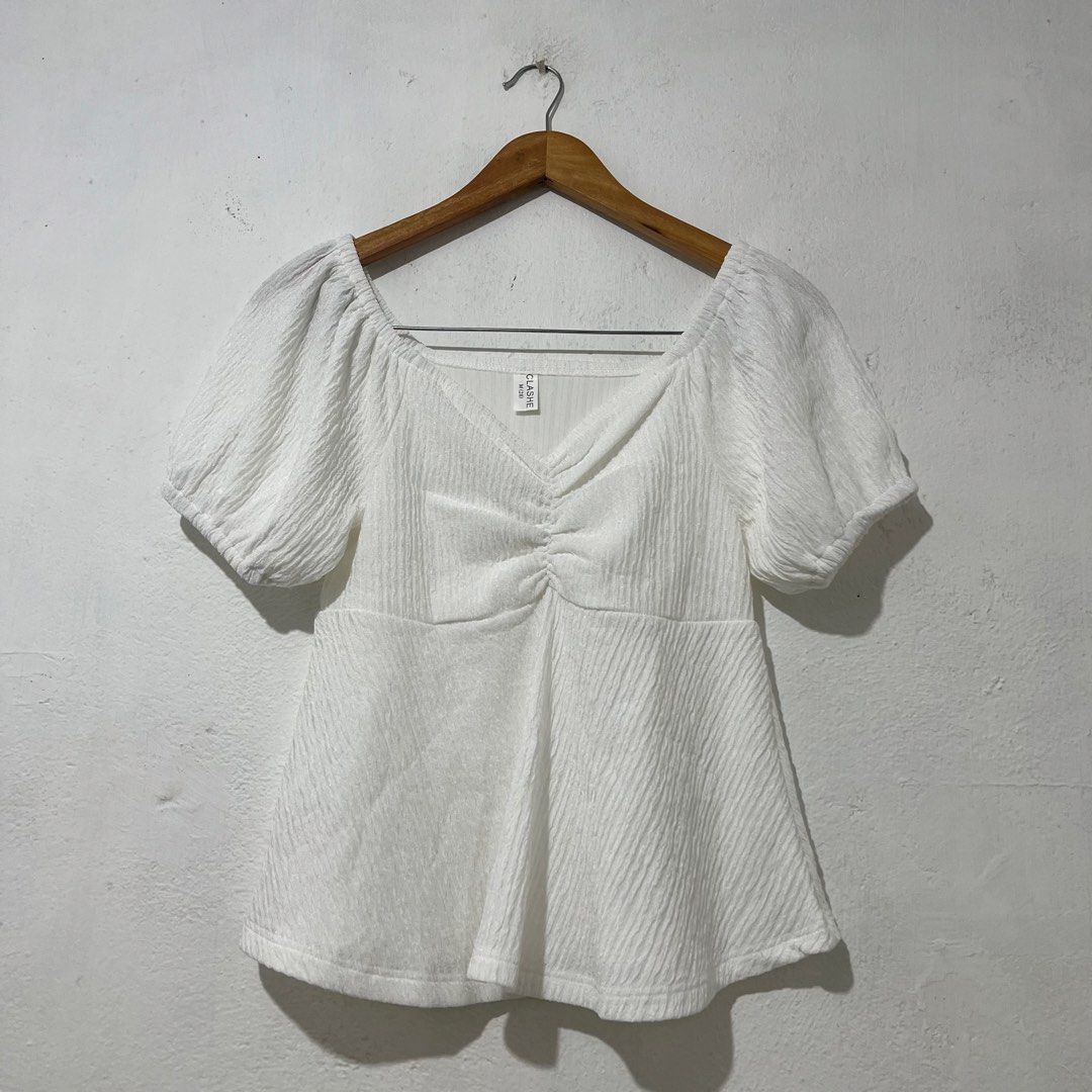 Clashe Women's White Blouse [Medium] (Category: Blouses) located in Quezon City. Submitted by jpsstore (Listing ID 1464636295, Image 1). Description: Size: Medium Width: 16" Length: 21" No issue MOP: Gcash SHIPPING: J&t | Lalamove.