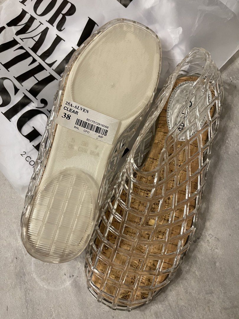 CLN ALVEN Clear Flats Size 38 Mesh Like (Category: Flats & Sandals) located in General Trias. Submitted by 1992thelabel (Listing ID 1464697851, Image 2). Description: 🐶🐱Proceeds go to my rescue dogs, cats & strays. Your purchase would mean a lot! Thank you 🐾 - Brand: CLN - Style: Alven transparent woven flats - Color: Clear - Size: 38 - Design: Unique cage design with slip-on fit - Comfort: Cork footbed and textured rubber outsole - Condition:
