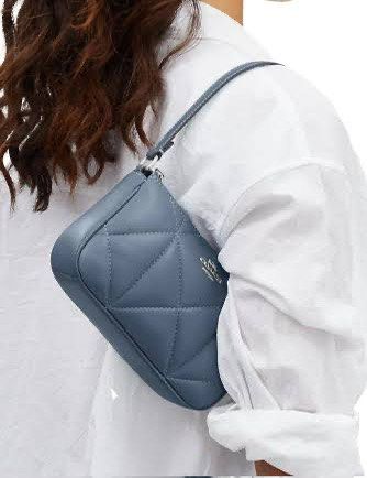 Coach (Category: Luxury Bags & Wallets) located in Baguio. Submitted by rheaanne07 (Listing ID 1464573636, Image 3). Description: Coach nolita 19 With puffy diamond quilting Orig Cutie 😉 May light stain sa harap and kurot sa likod sa side check photos Nice p nito and matibay.