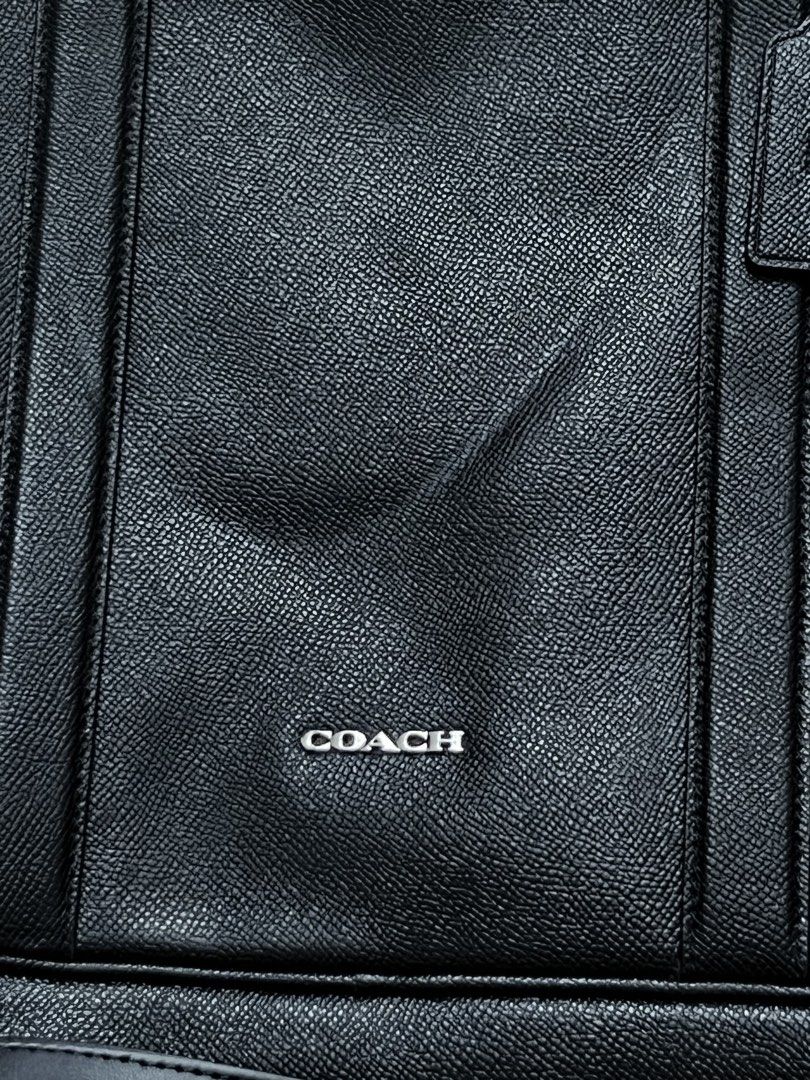 Coach Black Leather Briefcase With Shoulder Strap (Category: Briefcases) located in Victorias. Submitted by lan1877 (Listing ID 1464708152, Image 2). Description: - Brand: Coach - Material: Premium black leather with silver-tone hardware - Structure: Structured silhouette with dual top handles - Strap: Includes matching detachable and adjustable shoulder strap - Pockets: Front exterior slip pocket, interior zipper compartment, and classic Coach c