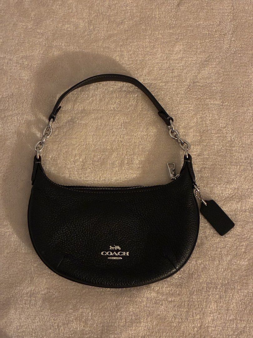 Coach Black Leather Shoulder Bag with Silver Chain (Category: Luxury Bags & Wallets) located in Manila. Submitted by another.wear (Listing ID 1464756224, Image 1). Description: ࿔ Original Coach shoulder bag Material: Black pebbled leather with silver-tone hardware 📍Manila.