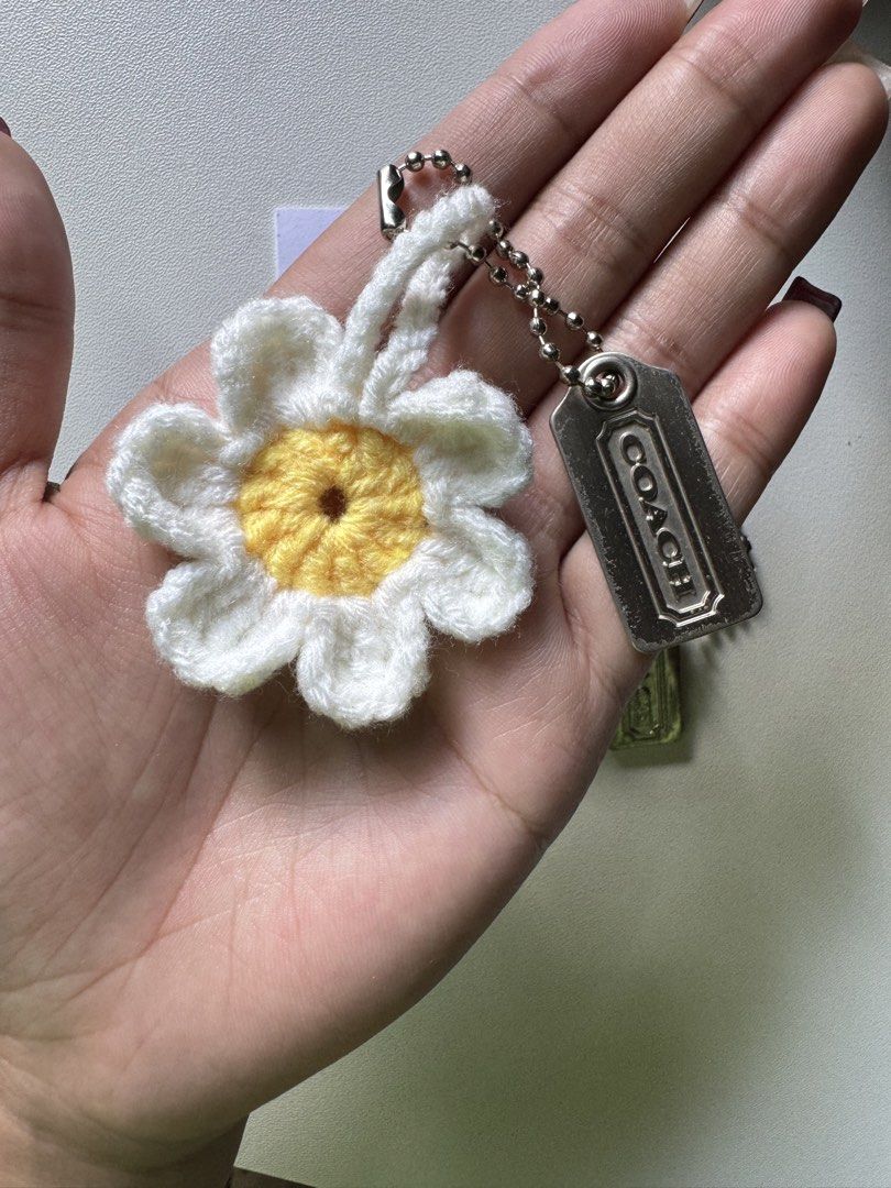 Coach Daisy Charm DIY (Category: Luxury Bags & Wallets) located in Lagawe. Submitted by favorsnflavors69115 (Listing ID 1464734341, Image 2). Description: DIY project Daisy crochet + OG silver hangtag 299 each Add sf.