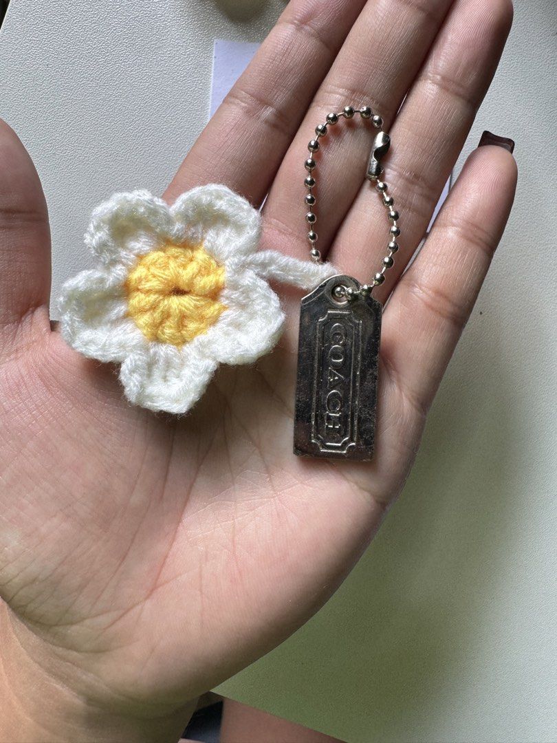 Coach Daisy Charm DIY (Category: Luxury Bags & Wallets) located in Lagawe. Submitted by favorsnflavors69115 (Listing ID 1464734341, Image 3). Description: DIY project Daisy crochet + OG silver hangtag 299 each Add sf.