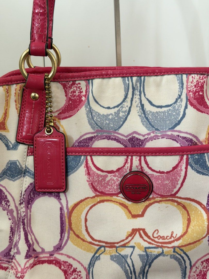 coach dark pink scribble logomania bag (Category: Luxury Bags & Wallets) located in Bulacan. Submitted by femalethings (Listing ID 1464663421, Image 2). Description: rare - flaws - stains bottom, minimal cracks on handle mop gcash bdo mod jnt loc bulacan.
