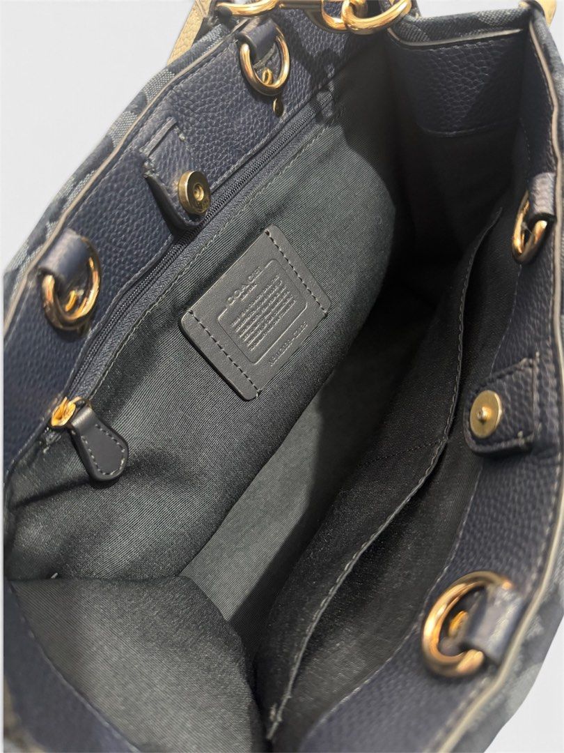 COACH DEMPSEY CARRYALL SHOULDER BAG (Category: Shoulder Bags) located in Dasmarinas. Submitted by nvrgobrkagain. (Listing ID 1464588095, Image 3). Description: AUTH 💯 WIDTH : 9 INCHES HEIGHT : 10.5 INCHES ISSUE : ONE MINIMAL RUB UNDER THE LEATHER AND A MINIMAL COLOR TRANSFER (CAN BE REMOVED) ALL DETAILED PICS POSTED 🖤 MEETUP/SHIPPING AVAILABLE 📩.