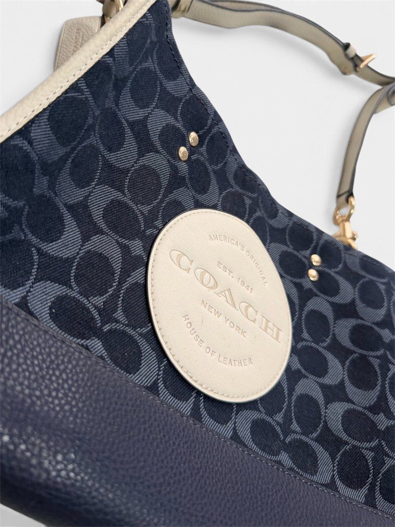 COACH DEMPSEY CARRYALL SHOULDER BAG (Category: Shoulder Bags) located in Dasmarinas. Submitted by nvrgobrkagain. (Listing ID 1464588095, Image 2). Description: AUTH 💯 WIDTH : 9 INCHES HEIGHT : 10.5 INCHES ISSUE : ONE MINIMAL RUB UNDER THE LEATHER AND A MINIMAL COLOR TRANSFER (CAN BE REMOVED) ALL DETAILED PICS POSTED 🖤 MEETUP/SHIPPING AVAILABLE 📩.